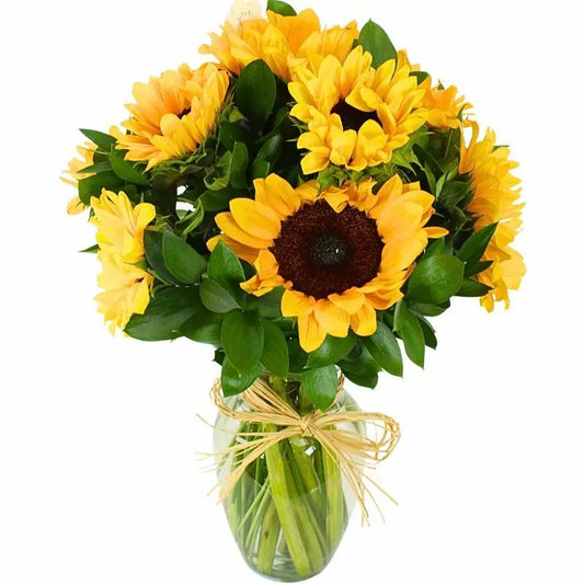 Florero con girasoles y ruscus